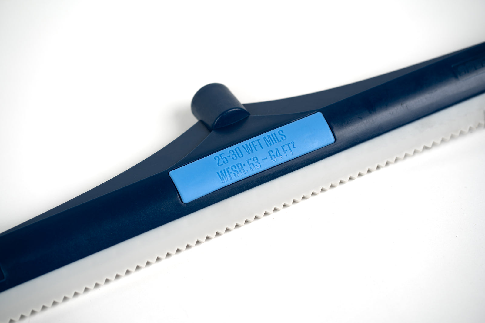 Large 24 inch, 25-30 mils, notched squeegee rake Diagonal close up