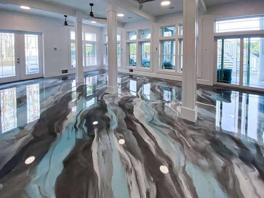 Metallic diagonal mica floor epoxy design within a home's main living space. This shows the gloss 2 part water based urethane from Mckinnon Materials. 